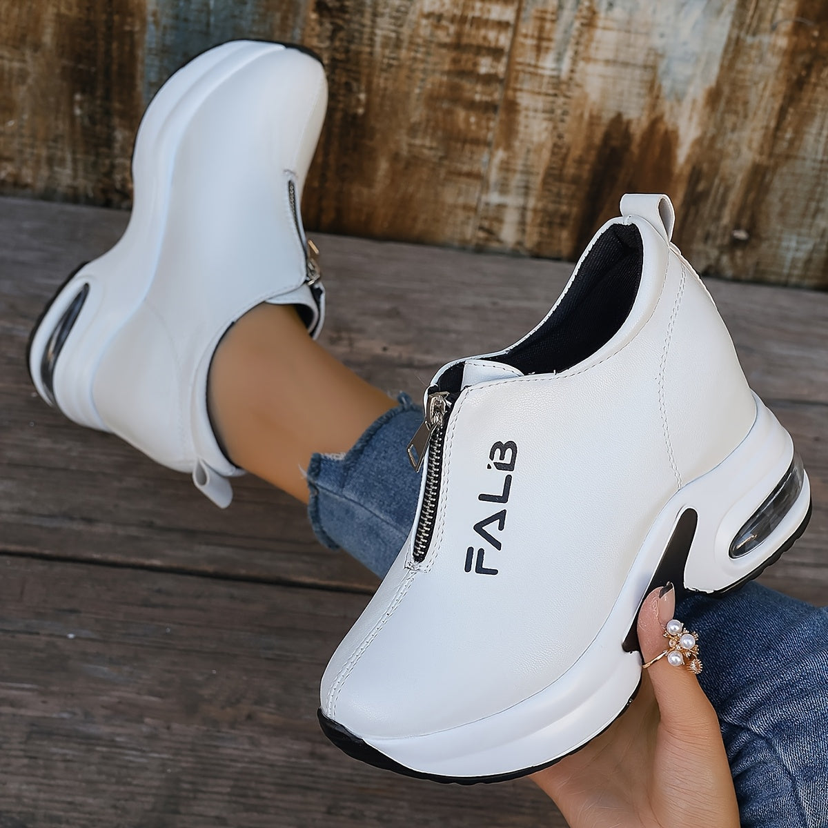 1 Pair Women's Fashion Sneakers with Air Cushion, Zipper Closure, Solid Color, Low Top, and Rubber Sole.