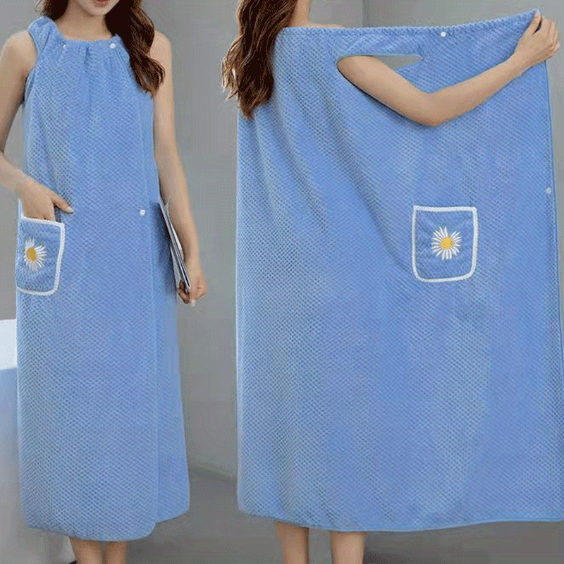 Extra-long light blue coral fleece bath towel with daisy pocket. Highly absorbent, machine washable, soft, and durable. Perfect for bathroom or robe wear.