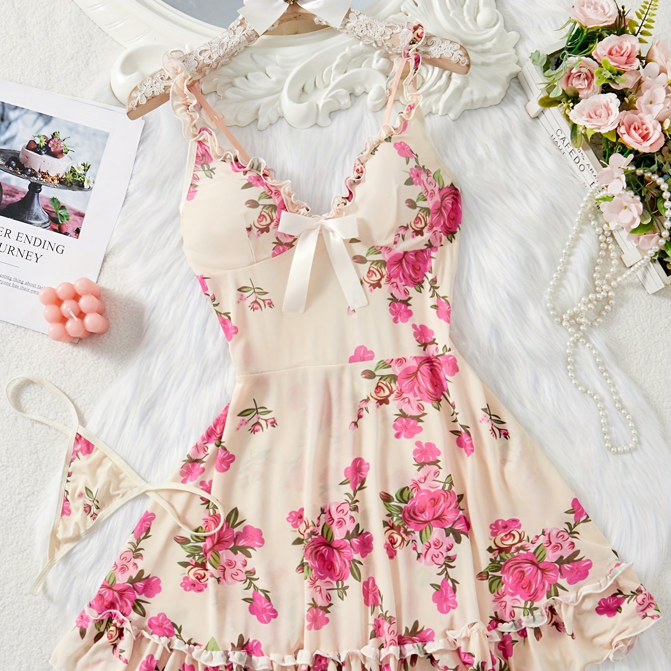 Floral print two-piece sleepwear set with ruffle hem and adjustable straps includes lingerie night dress and matching thong for women.