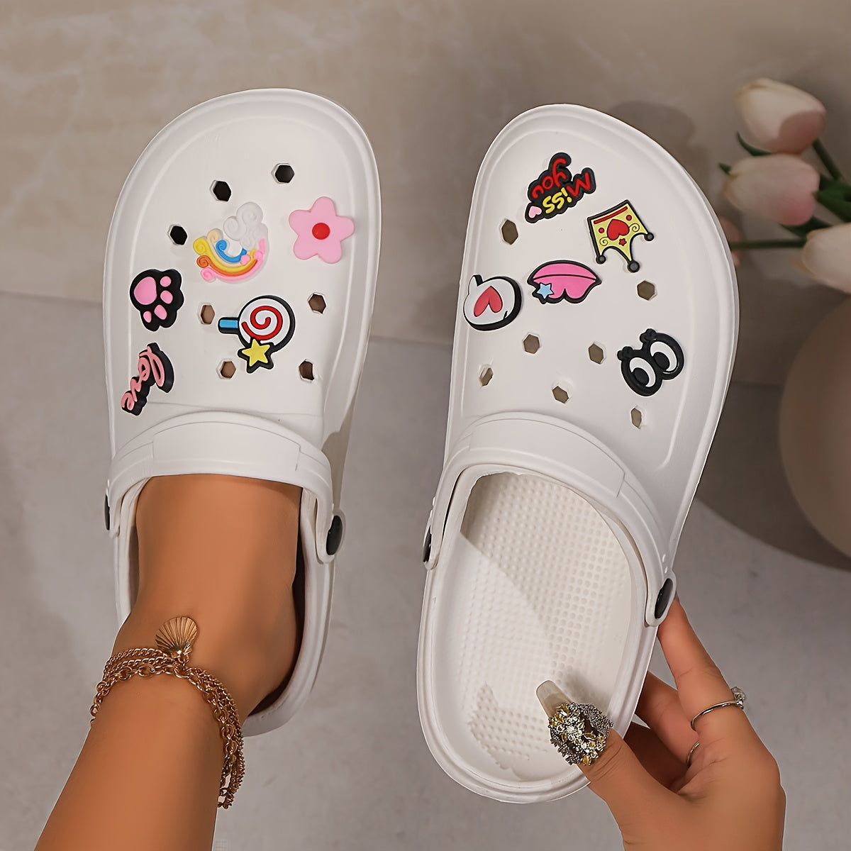 Elegant summer clogs for women - breathable beach sandals with thick soles and charm detail, versatile slip-on shoes for outdoor wear.