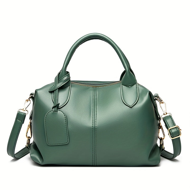 Stylish shoulder bag with removable strap and zip closure, perfect for everyday use.