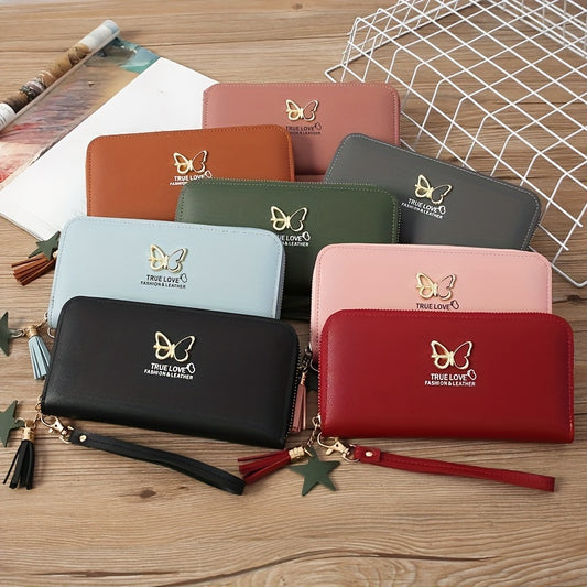 Butterfly wallet made of faux leather with wristlet, multiple card slots, zip closure, animal pattern, and polyester lining. Perfect gift for various occasions. Random color wristband