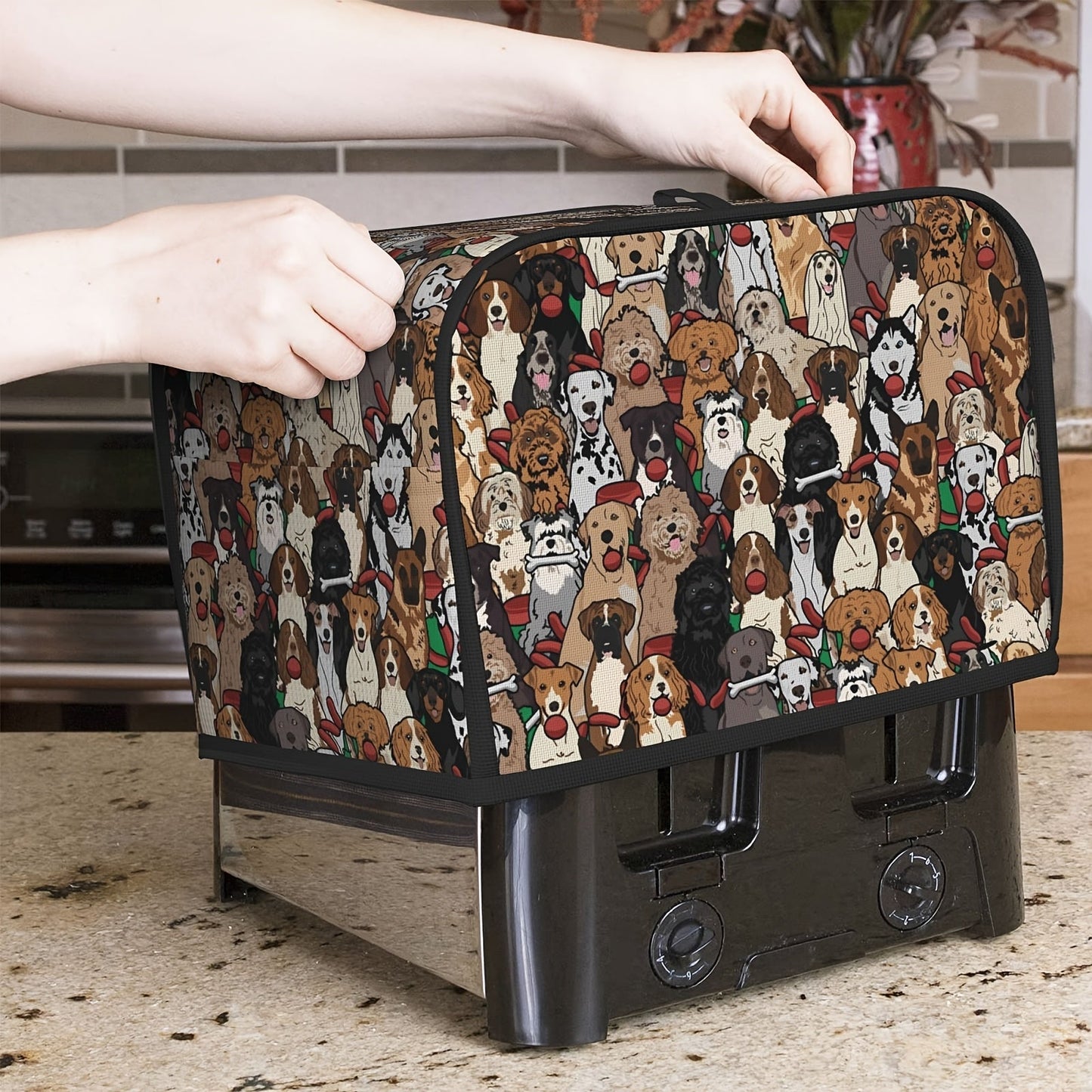 This toaster cover has a cute cartoon dog design with animal elements, perfect for protecting your appliance from dust and fingerprints. It's machine washable and fits a two-slice toaster, making it a convenient and easy-to-clean kitchen accessory.