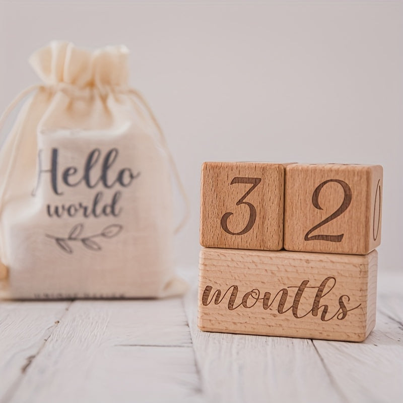 Wooden Milestone Blocks Set - Perfect for Full Moon Photo Props, Celebrating Growth Milestones, Preserving Birth Month Memories. The set includes light brown wood blocks and a cute "Hello World" drawstring bag.