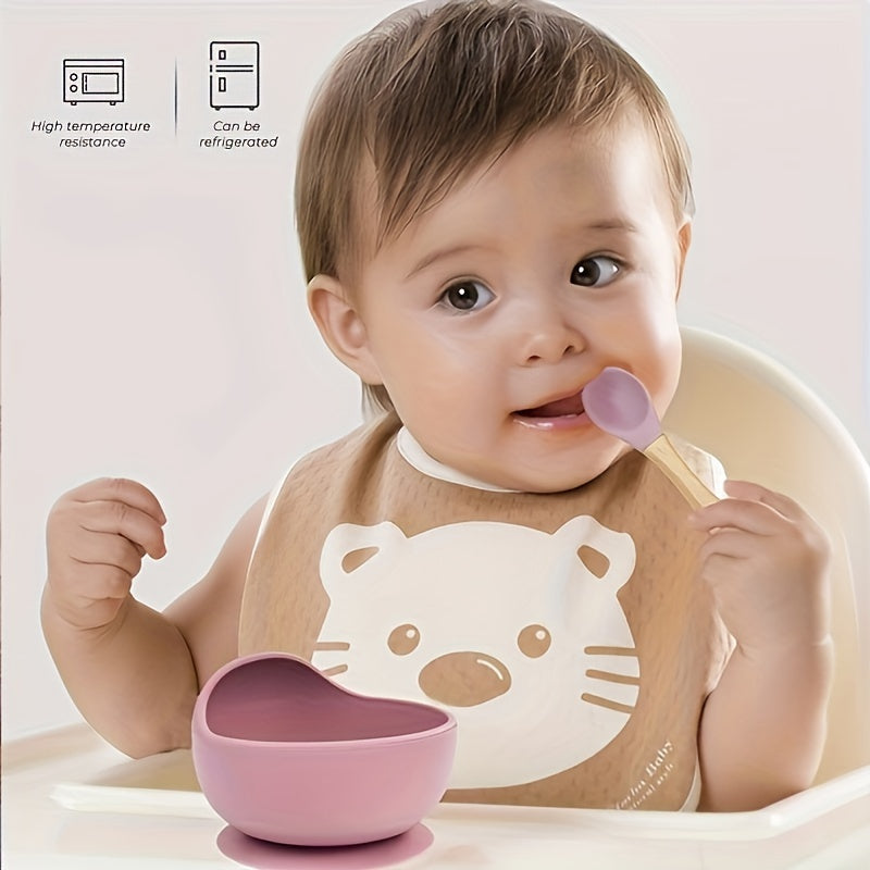 Three pieces of silicone feeding bowl, fork, and spoon set with durable suction bowl. Includes feeding kit with wooden handle, non-slip design, and microwave safe.