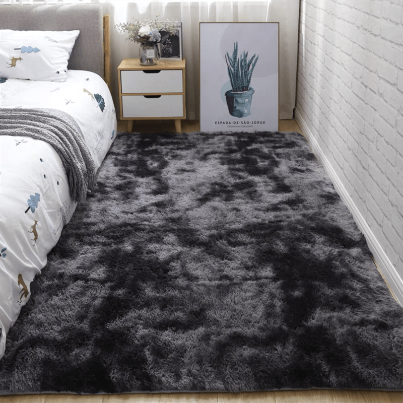 Soft plush area rug, perfect for any room in your home! This non-slip fuzzy shag rug is ideal for adding a touch of luxury to your bedroom or living room. The tie-dyed design adds a unique and stylish touch to your decor. Made with pet-friendly