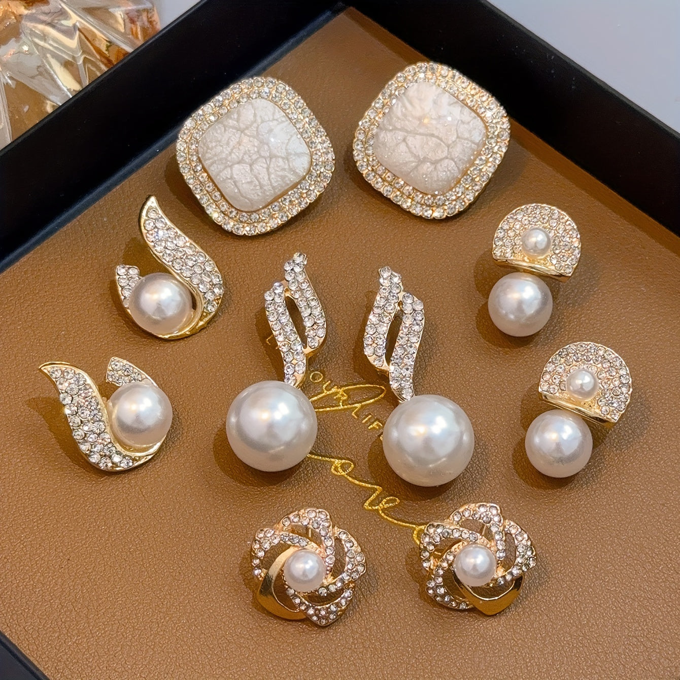 French-inspired sweet earrings set with deluxe faux-pearl, ice-crack floral, and flame design in an elegant vintage style fashion.