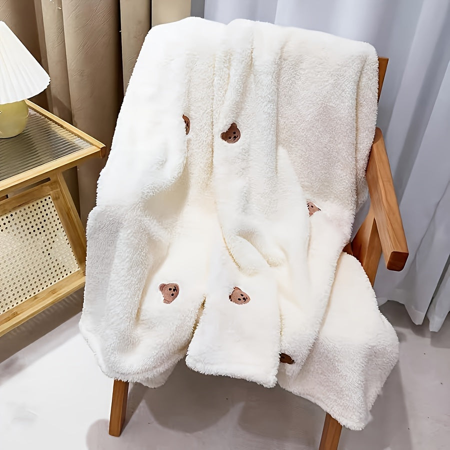 Soft and plush baby bear throw blanket with embroidered details, perfect for keeping newborns, infants, and toddlers aged 0-3 years warm and cozy. Ideal for outdoor use as a swaddle or wrap for babies.