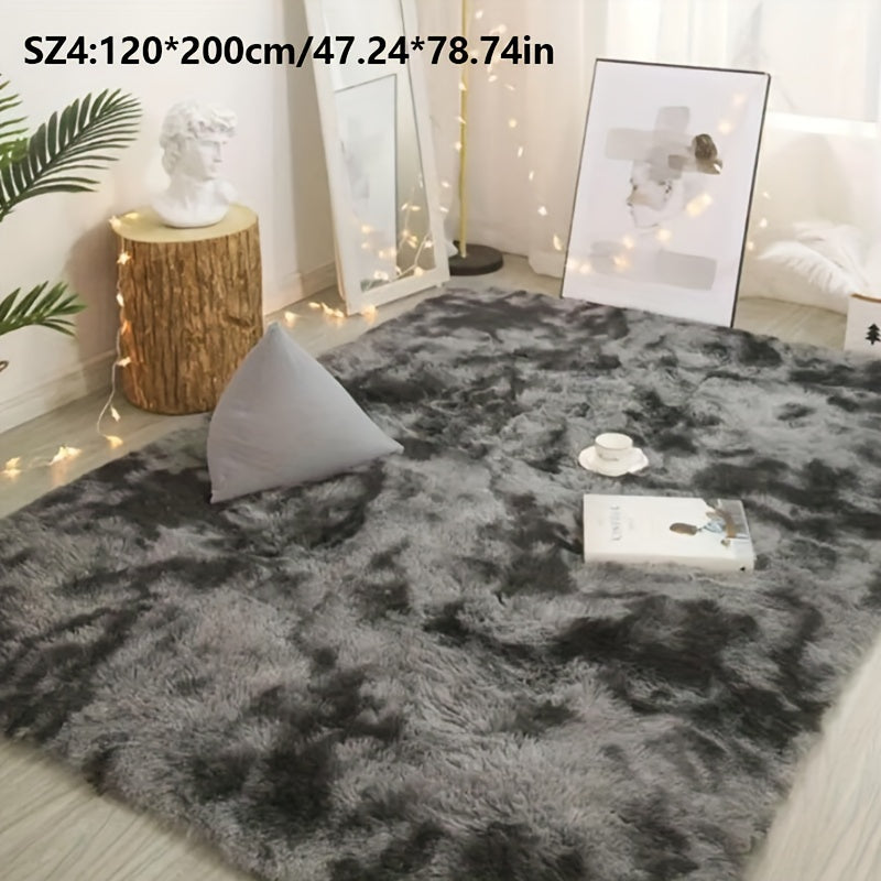 Long fleece carpet in a dark grey tie dye gradient, perfect for the living room coffee table or bedroom decor. This washable mat is fully padded and makes a great Halloween or Christmas gift.