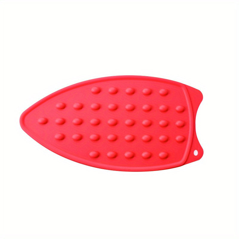 Multi-functional ironing mat made of silicone - easily foldable, extra thick and waterproof, with a non-slip backing. Ideal for use in apartments, dormitories, and travel.