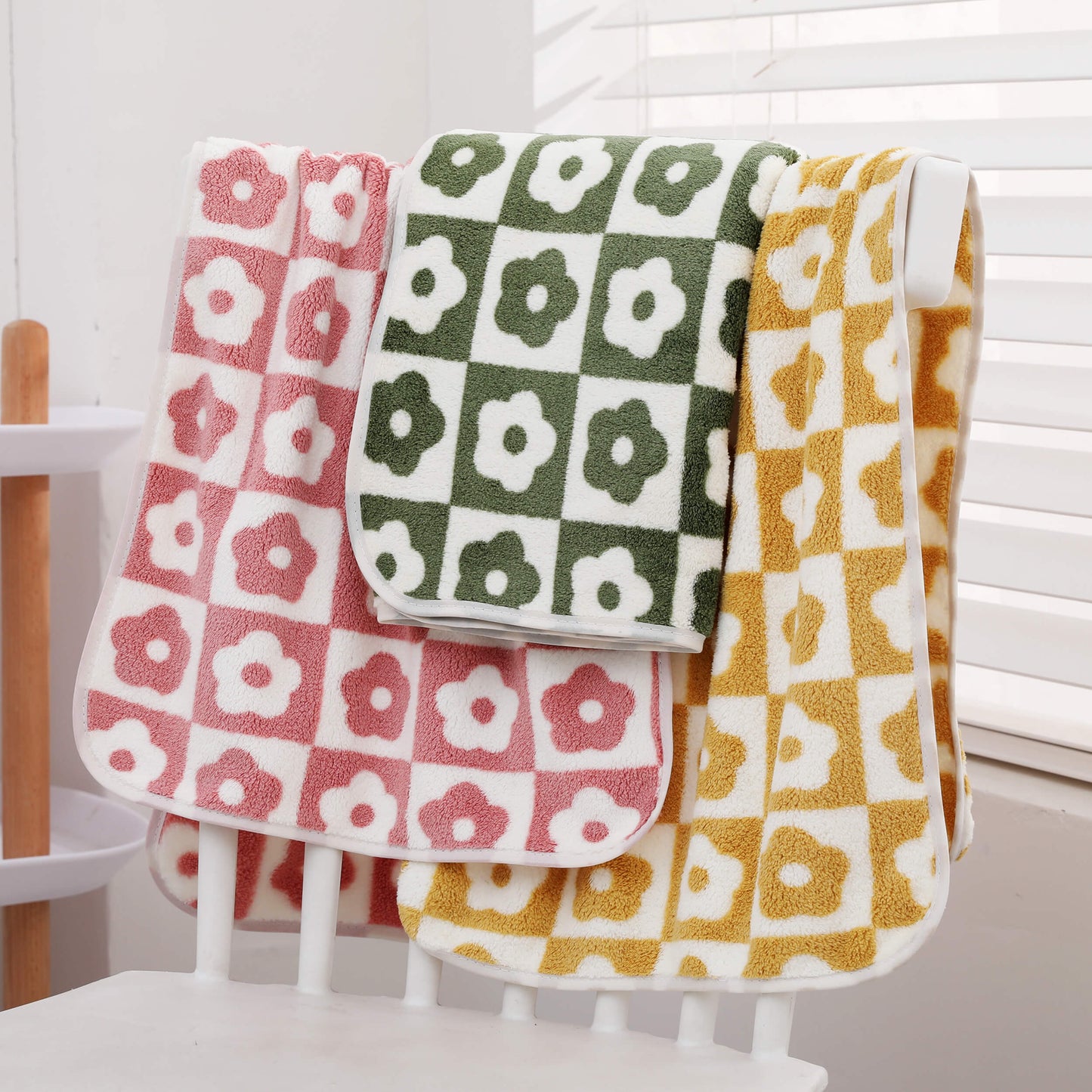 Three soft coral fleece hand towels with plum blossom design, highly absorbent and quick-drying, sized at 34.8x74.93cm.