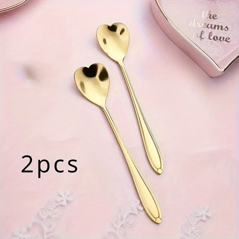 Celebrate love with 2 stainless steel coffee spoons shaped like hearts, the perfect gift for Valentine's Day. These creative spoons are perfect for stirring desserts and are ideal for Christmas parties, holidays, restaurants, and home use.