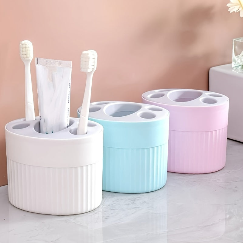 Toothbrush holder stand for bathroom countertop storage.