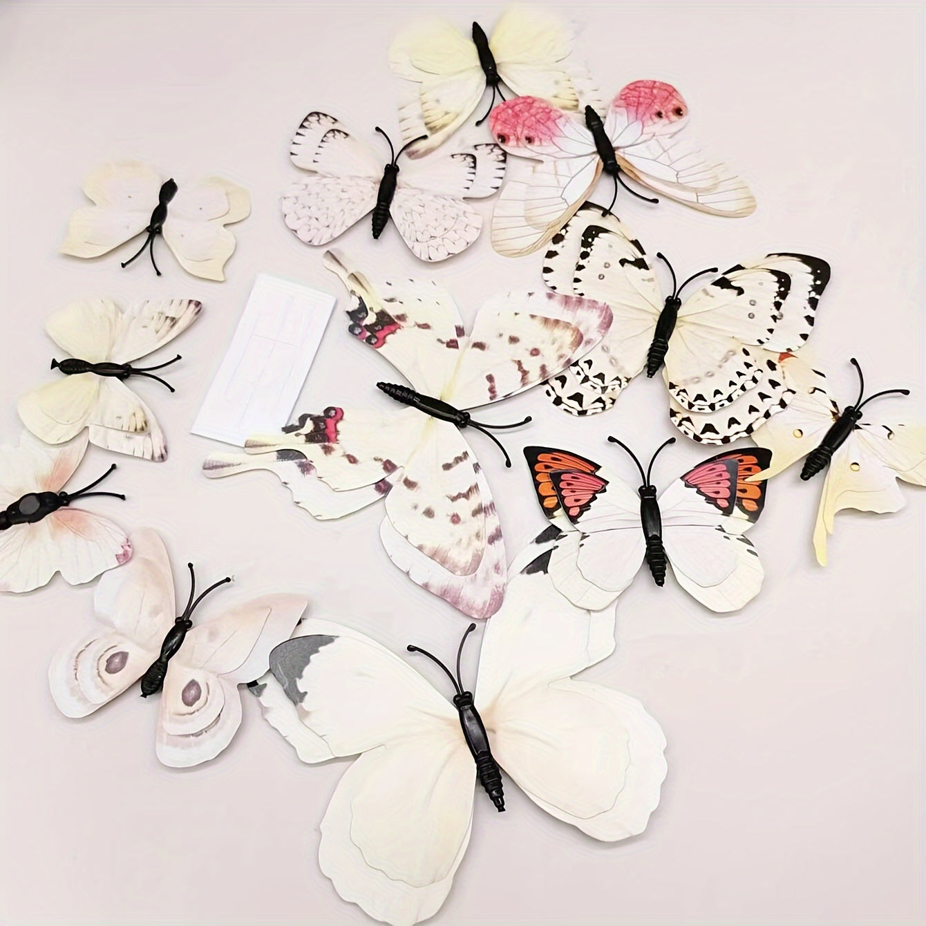 12pcs of vibrant 3D butterfly wall decals in blue shades, double-layer design, removable and self-adhesive stickers for home decor, parties, and weddings. Made of paper, these butterfly decorations are perfect for adding a touch of nature to your living