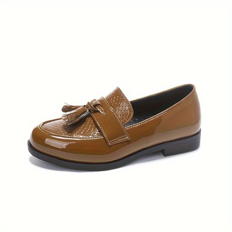 Men's casual loafers in black with non-slip TPR sole, lightweight slip-on design, tassel detail, and versatile for indoor and outdoor wear.