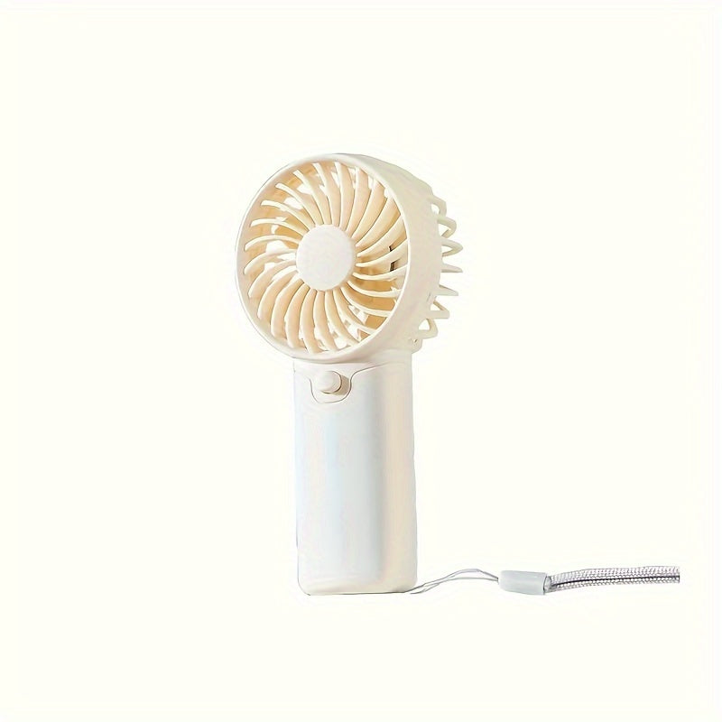 Compact Plastic Mini Handheld Portable Fan, Perfect for Personal Face Cooling On the Go! Battery Operated with Button Control, Ideal for Indoor and Travel Use. Requires 2 AAA Batteries (Not Included). Multiple Components Included.