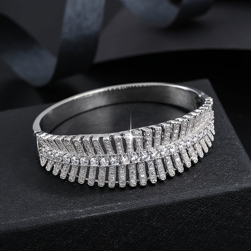 An elegant and stylish zirconia-encrusted bracelet with a chic hollow design