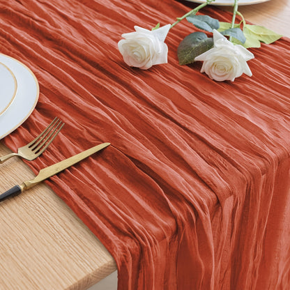 Elegant rust-colored cheesecloth table runner for spring, holidays, weddings - farmhouse chic design.