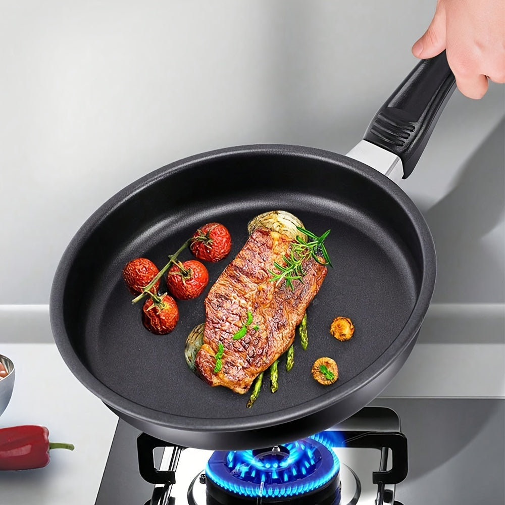 This versatile non-stick frying pan is perfect for cooking eggs, steak, and breakfast dishes. It can also be used for barbecue and other kitchen tasks. The pan is oil-free and smoke-free, making it a great addition to any household. It is suitable for