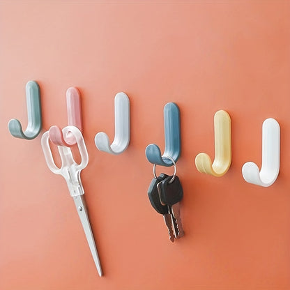 6 Mini Wall Mounted Hooks in 6 Colors for Hanging Items Easily.