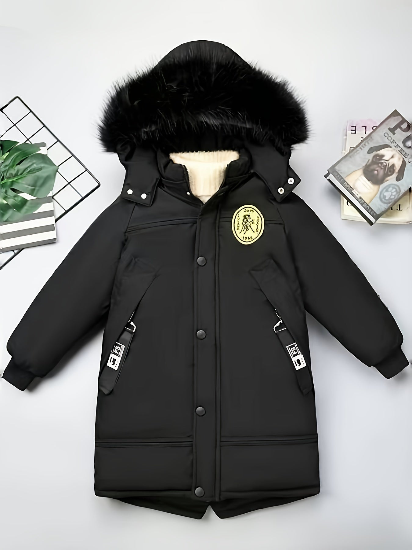 Medium-long boys' winter jacket with fur collar and hood for extra warmth and windproofing.