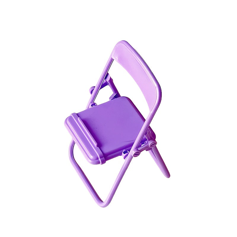 Modern collapsible tiny chair made of plastic, perfect for your desk, doubles as a portable phone stand, no need for assembly, does not require electricity.