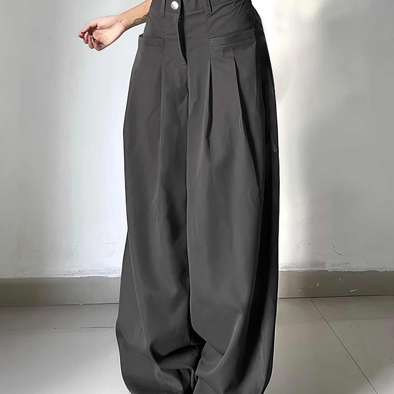 High-waisted button-front work pants in solid colors for women's office attire.