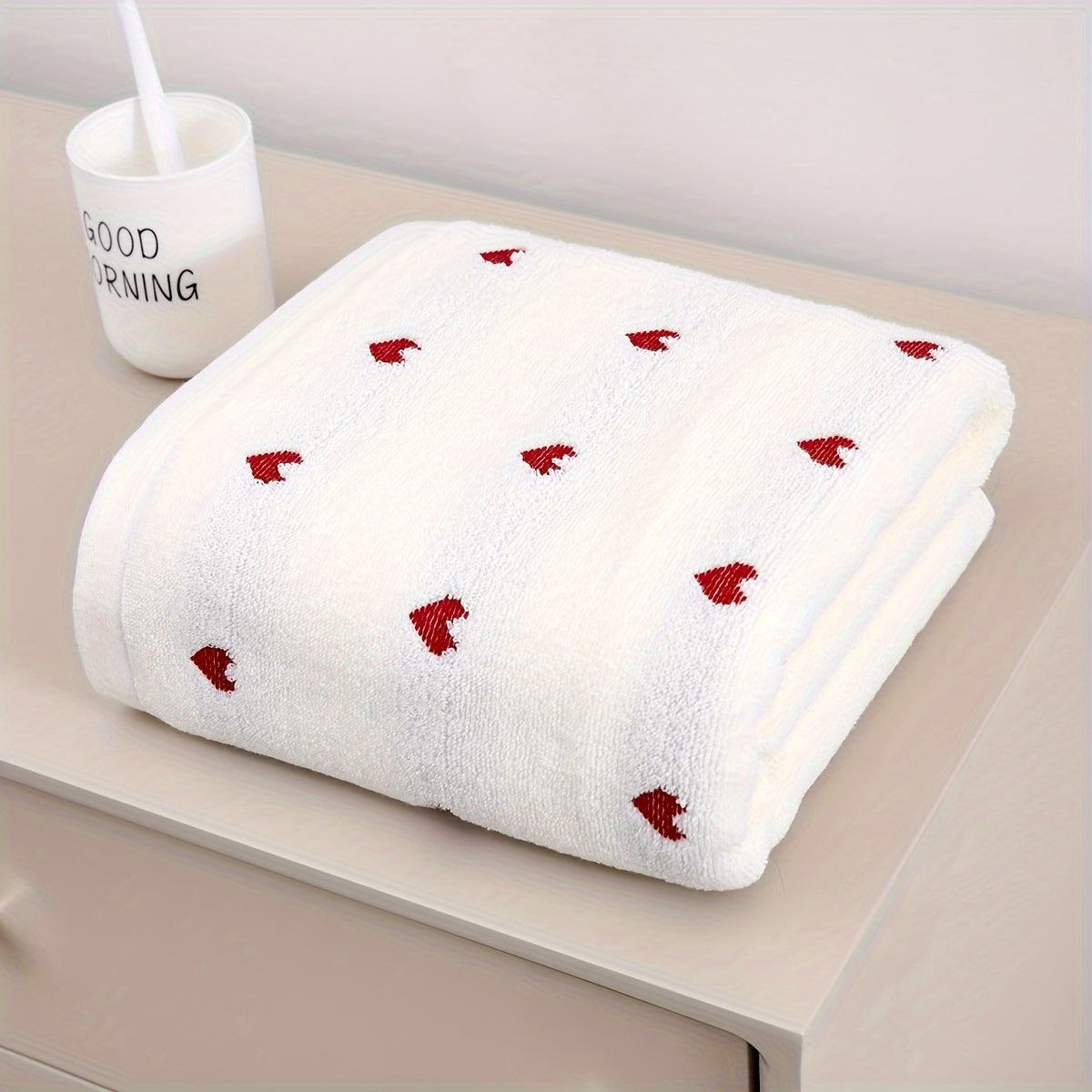 Heart pattern cotton bath towel, absorbent and quick-drying, soft and thick for home bathroom use. Ideal bathroom supply.