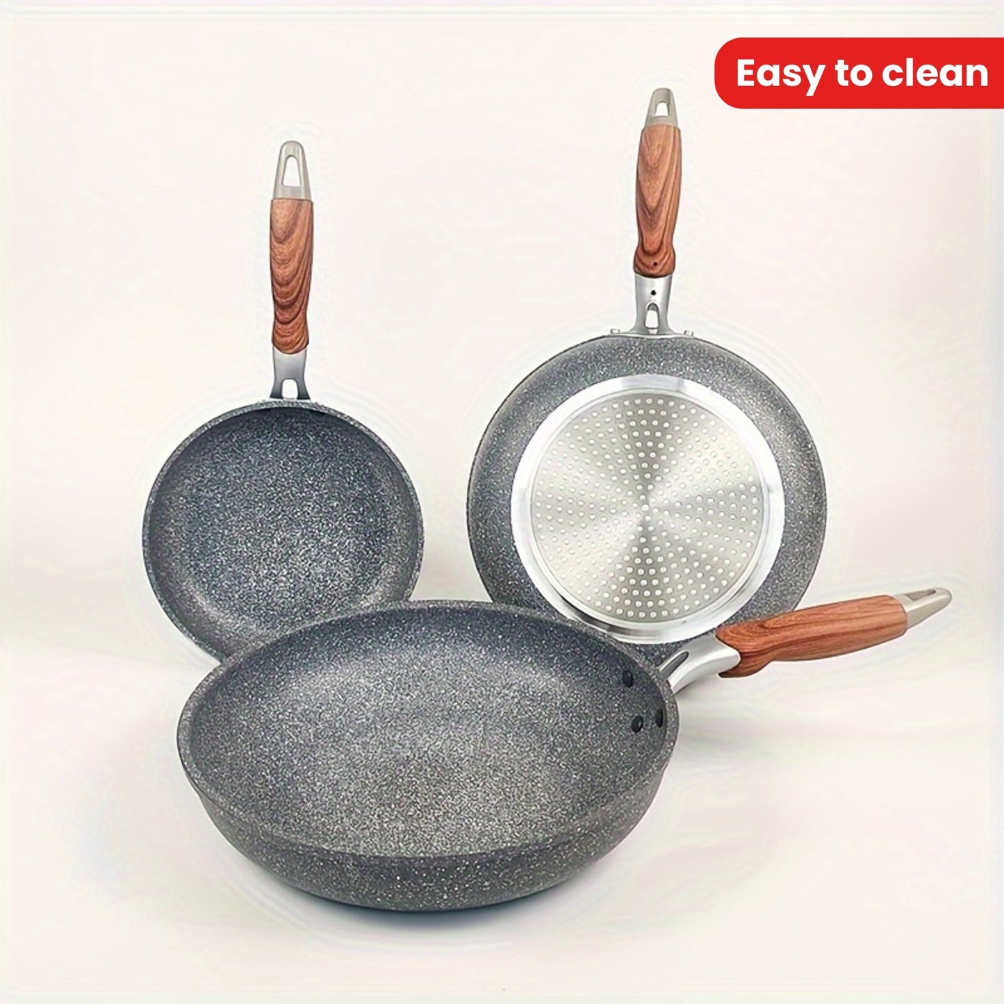 Set of 3 multi-sized frying pans made of cornstone material. Features a flat bottom design, non-stick coating, rust-resistant, easy to clean, compatible with induction cookers and gas stoves. Complete with anti-scald handles for safe cooking.