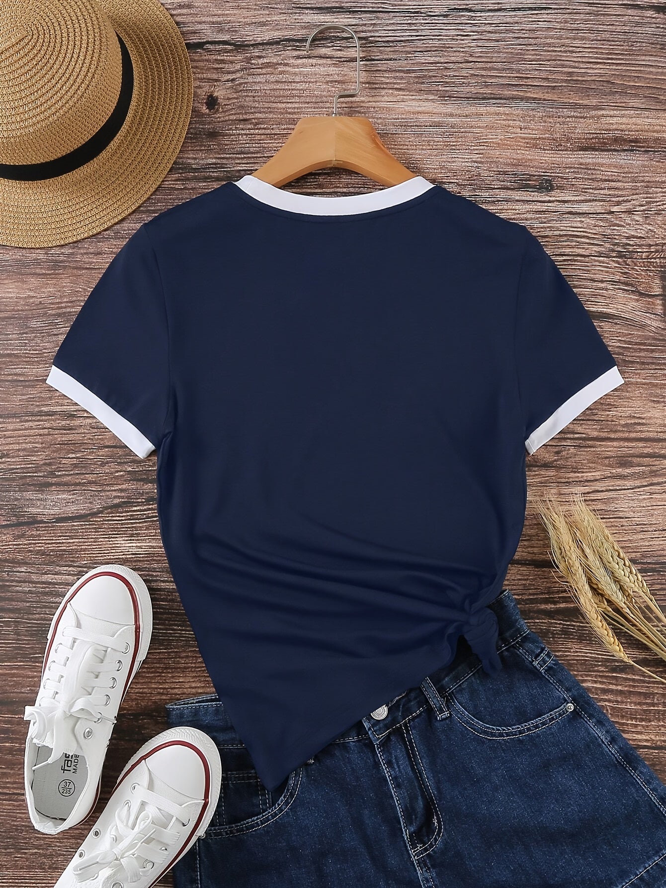 Summer women's sports t-shirt, solid color, medium stretch polyester knit fabric, casual round neck with color block detail.