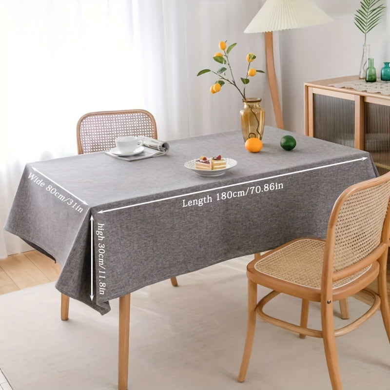 Modern grey polyester tablecloth, waterproof and thickened, machine woven, 100% polyester, for a rectangular dining table.