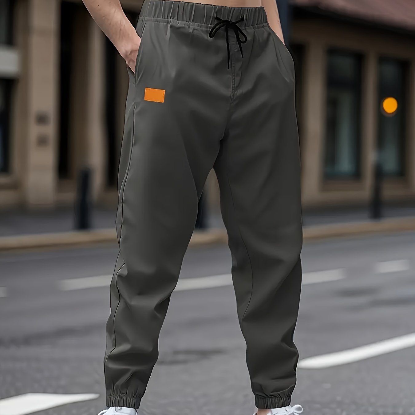 Men's casual cargo pants with drawstring waist, non-stretch polyester fabric, regular fit, lined with polyester, ideal for weekend wear.