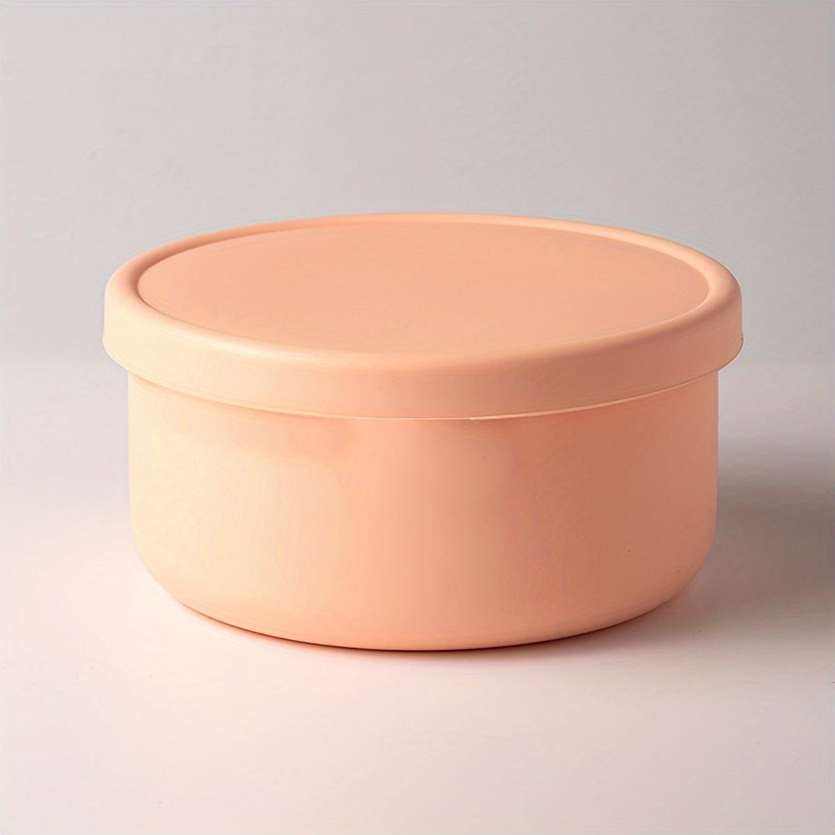 Multi-functional Storage Container made of Silicone - Does not contain BPA, can be used in the Microwave and Freezer. Ideal for storing Fruits, Vegetables, and Lunch items. Circular Kitchen Container with a convenient Flip-Top Cover.