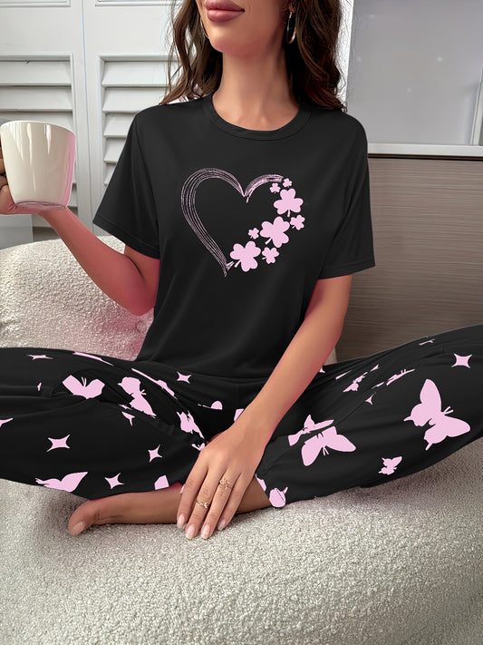 Short-sleeve top and shorts set with hearts, butterflies, and four-leaf clovers pattern, for sleepwear and loungewear.