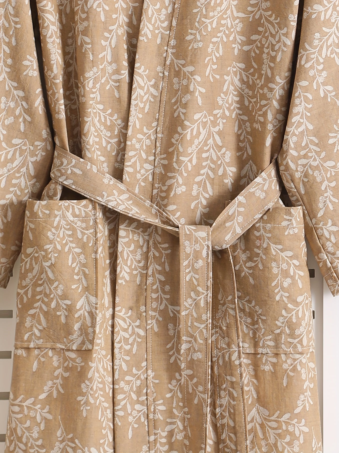 Women's lightweight cotton jacquard bathrobe with floral pattern, quick-dry absorbent fabric, long sleeves, v-neck, and belt in beige/floral design. Ideal for spring, summer, and fall.