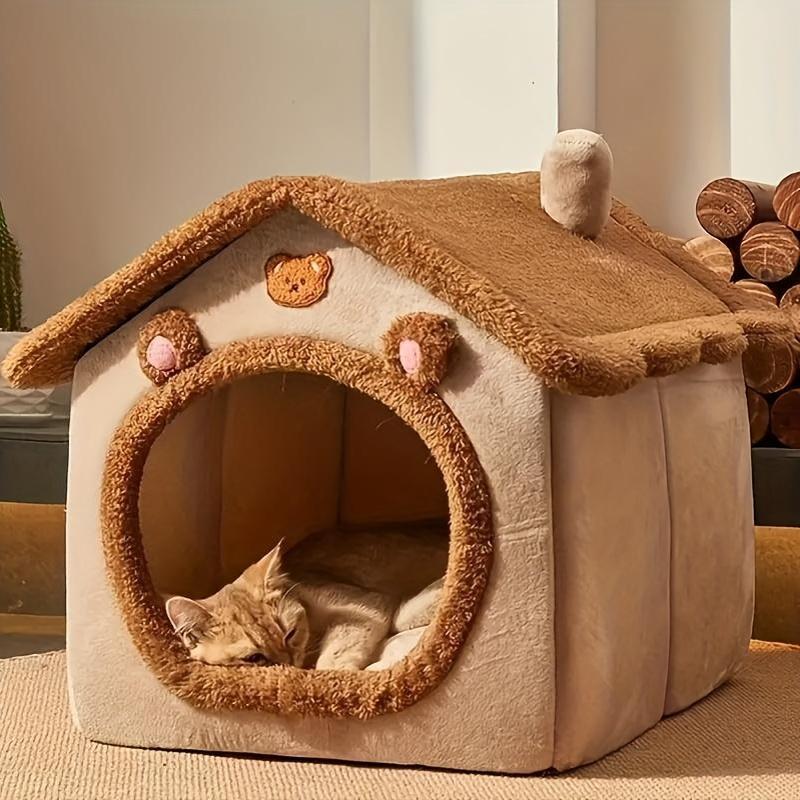 Foldable pet bed for cats and dogs, washable and comfortable for warmth.