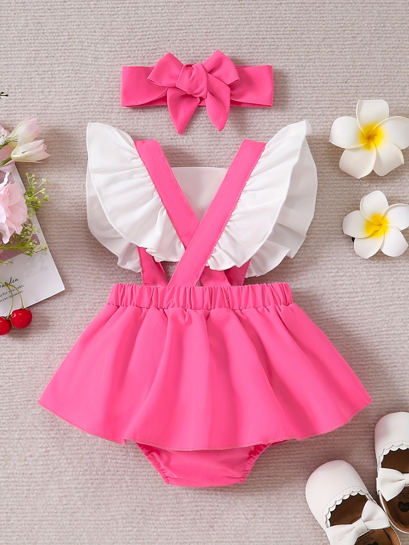 Sweet baby romper dress with cute color contrast letter print and flying sleeves.