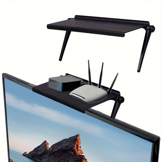 Adjustable shelf for TV or computer monitor with storage for media boxes, router, and office supplies.