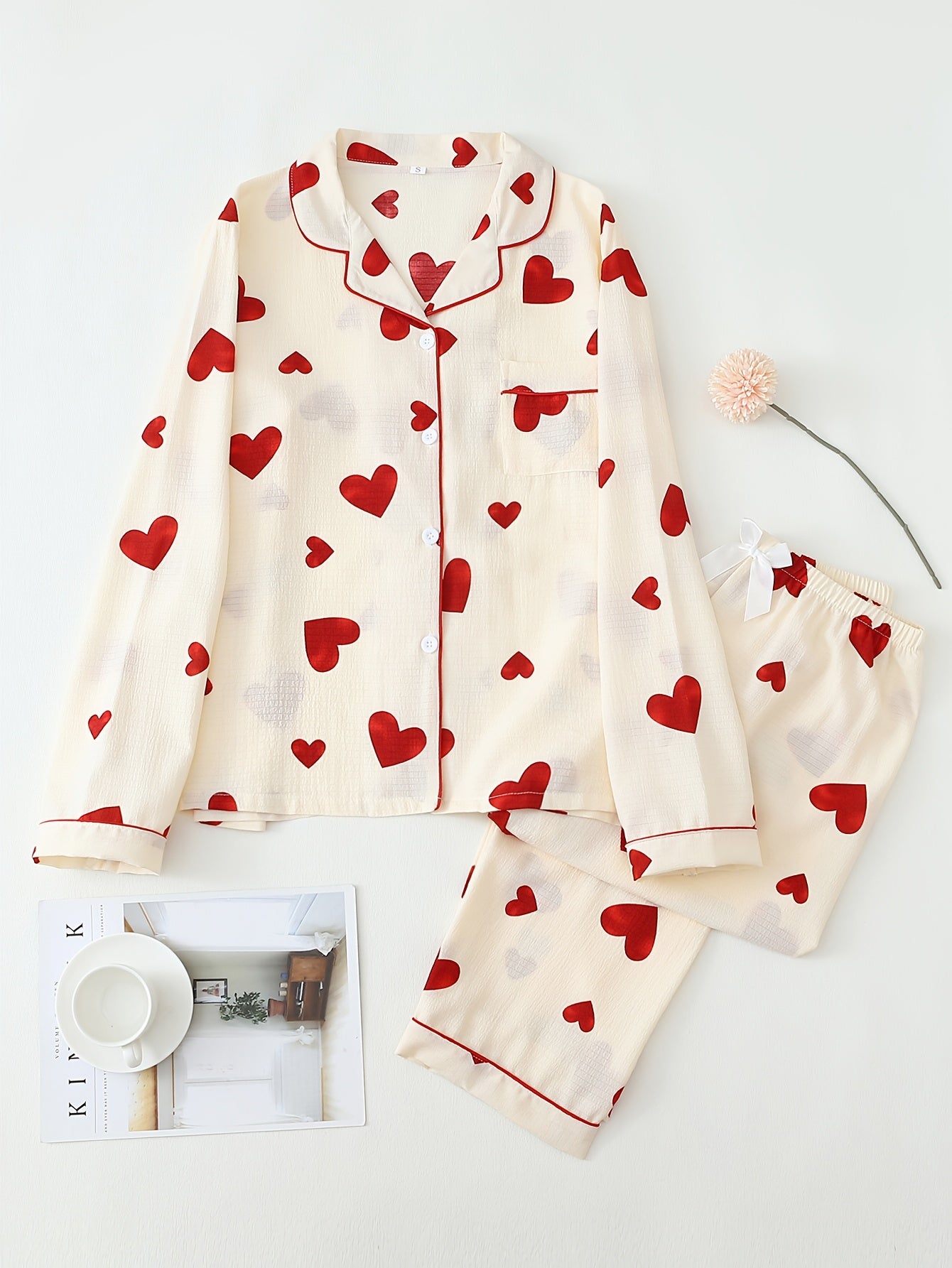 Teen pajama set with heart print, machine washable polyester blend, long sleeve top and pants.