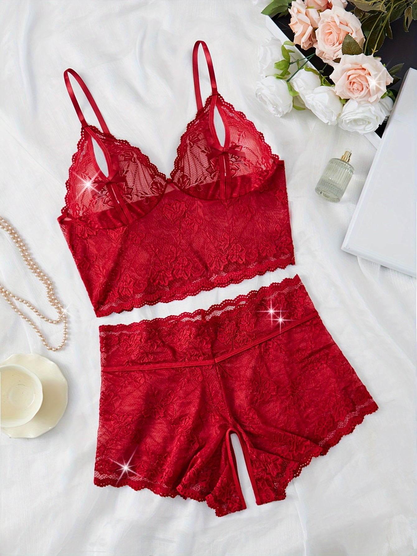 Sexy lingerie set with large size, flower lace, fan-shaped embellishment, bow front, and split bra and panty.