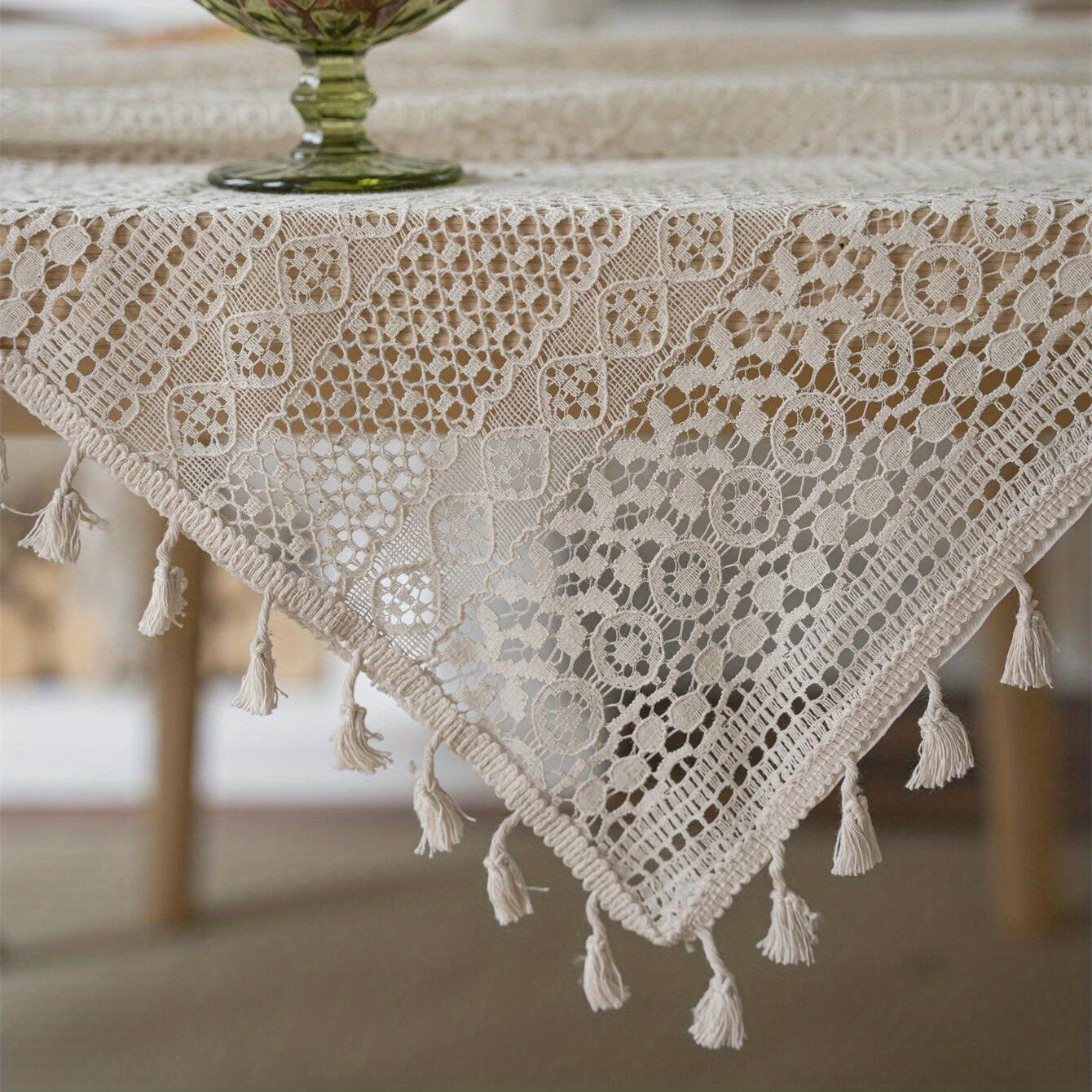 Bohemian chic crochet lace tablecloth, ideal for dining and parties. Rectangular polyester design with a farmhouse style, perfect for boho home decor. Great for buffet tables, banquets, and serving western food.