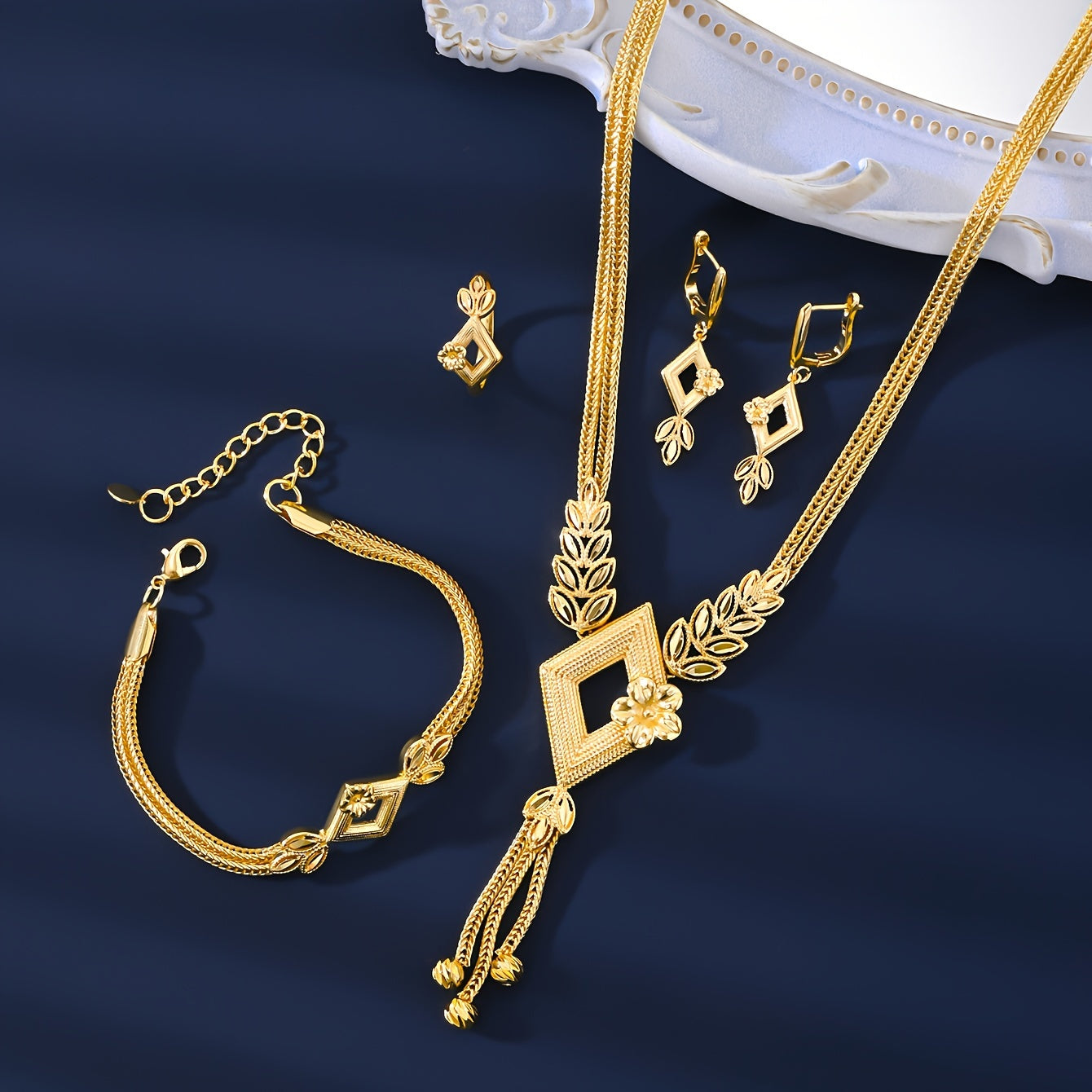 Vintage & Sexy Style 18K Golden Plated Copper Jewelry Set for Women, including Wedding Bridal Necklace, Bracelet, Ring, and Earrings. This all-season set is perfect for daily wear and gift giving.