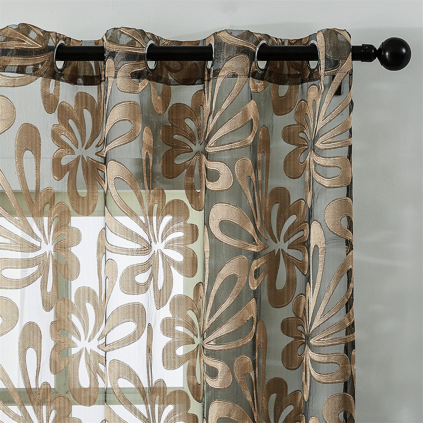 This Elegant Geometric Sheer Curtain Panel in Brown & White Floral Jacquard Design is made of lightweight polyester. It is machine washable and comes with eyelets for easy hanging. Ideal for enhancing the decor of your living room or bedroom.