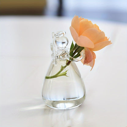 Stylish glass vase shaped like an angel, versatile for fresh or dried flowers, ideal for living room or dining table decor, no batteries needed.