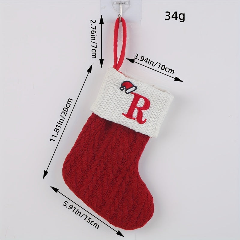 Knitted letter Christmas socks for home tree ornaments; red socks in gift bag for festive attire.