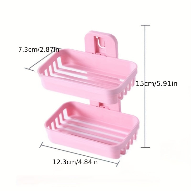 Wall-mounted soap holder with box drain for toiletries and shampoo.