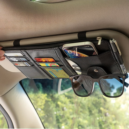 Car sun visor organizer with pockets for storage and accessories holder.