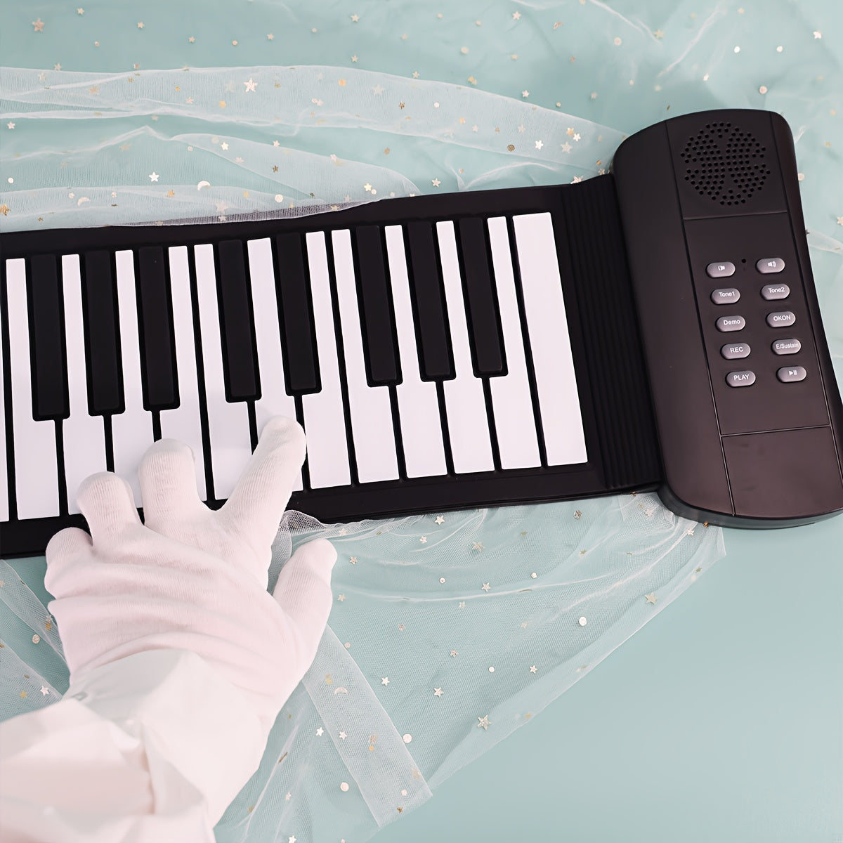 Micro Poly 49-Key Portable Roll-Up Piano Keyboard with Silicone Keys in Black. USB & Battery Powered, Ideal for Beginners. Compact and Easy to Carry Design, Perfect for Home Use. Includes