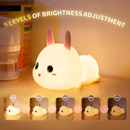 Adorable rabbit-shaped night light for bedroom, rechargeable and portable.