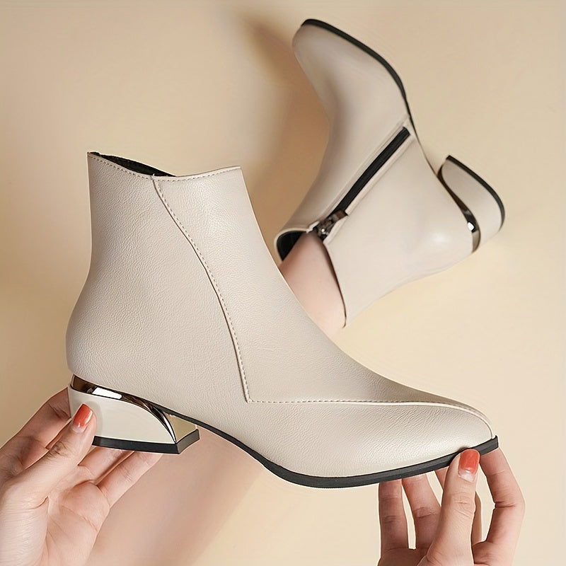 Women's low heeled ankle boots with pointed toe and side zipper, perfect for casual wear.